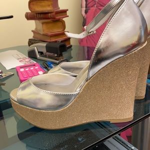 Gold and silver shoes never worn- 5 inch heel